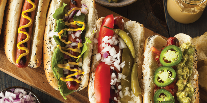 Hot dog variations on a table