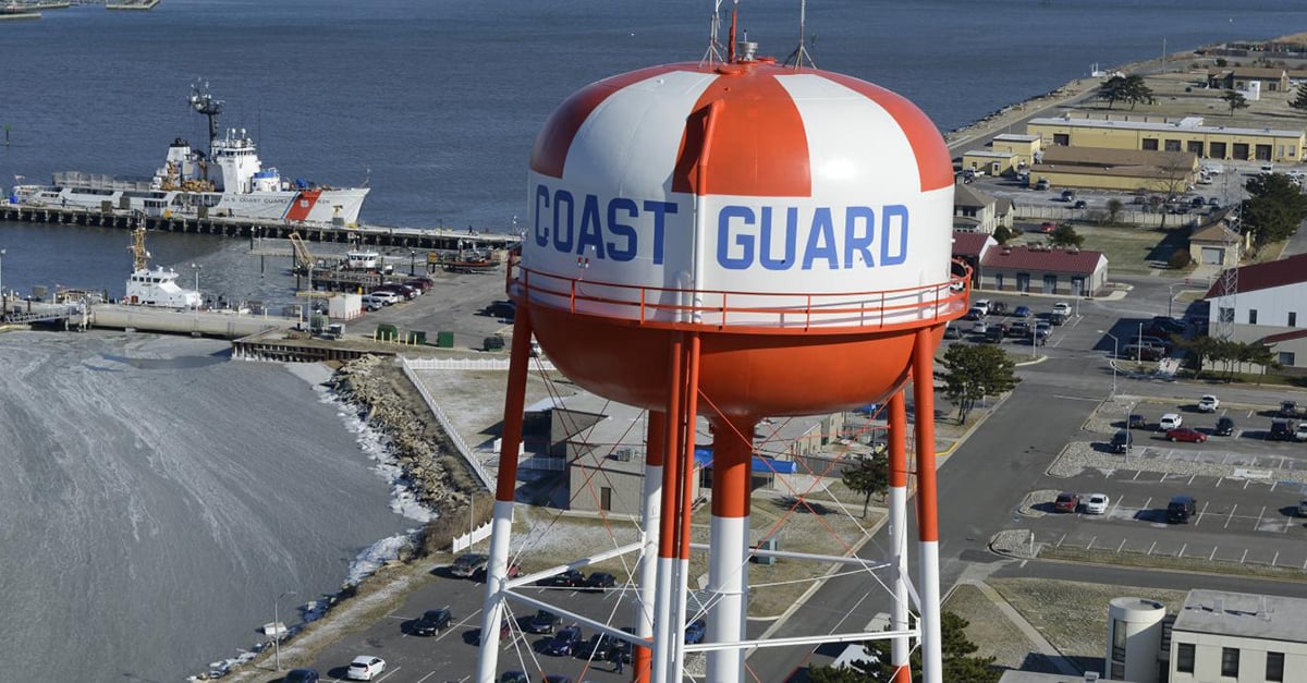 Coast Guard on water town overlooking harbor