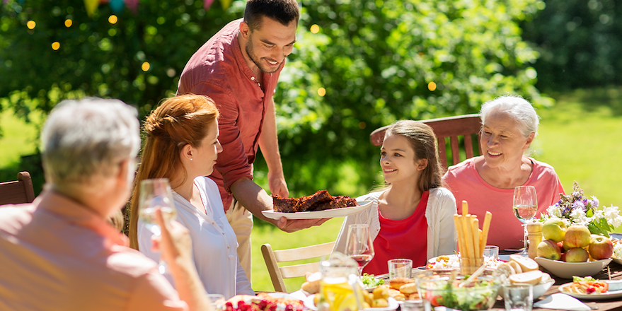 Family having a picnic outside