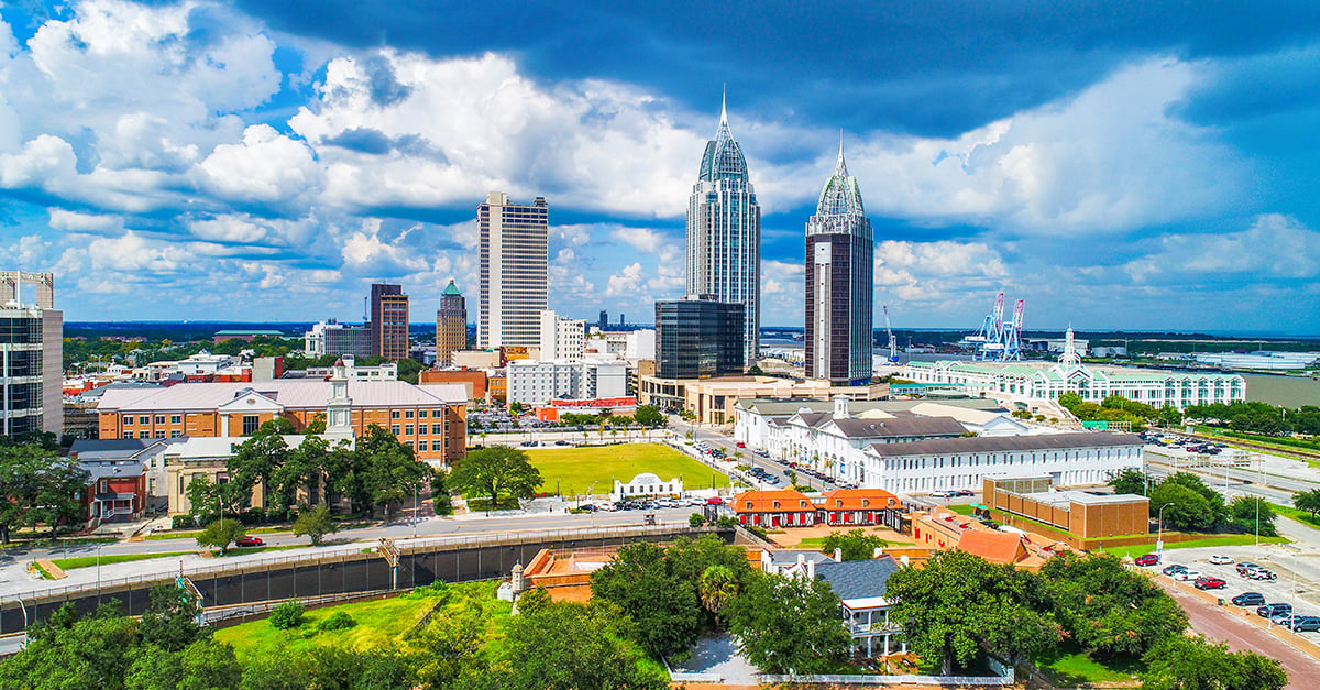 Mobile, Alabama skyline with buildings and blue sky