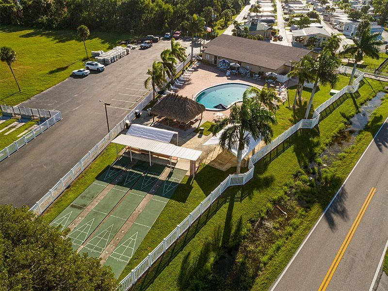 https://www.sunoutdoors.com/resourcefiles/hotelamenitysnippetimage/marco-naples-shuffleboard.jpg